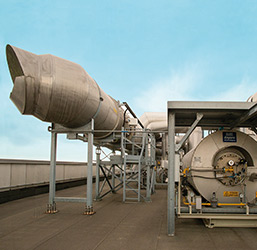 Pipe on top of factory building (photo)